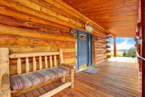 The front porch of a log cabin in the Smoky Mountains