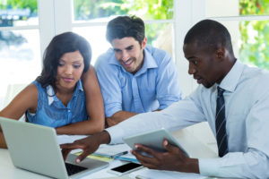 real estate agent talking to a couple